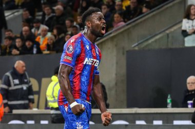 Crystal Palace 'dan Marc Guhi, Premier League maçında Wolverhampton Wanderers, Molineux, Wolverhampton, İngiltere' deki Crystal Palace 'a karşı 2-2' lik galibiyet golünü kutluyor.