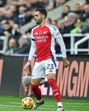 Mikel Merino of Arsenal with the ball during the Premier League match Newcastle United vs Arsenal at St. James's Park, Newcastle, United Kingdom, 2nd November 2024 clipart