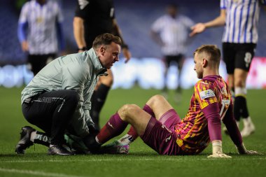 Norwich City 'den George Long, 5 Kasım 2024' te Sheffield Wednesday, Hillsborough, Sheffield City 'de Norwich City maçında tedavi gördü.