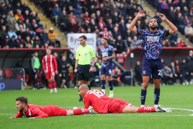 CJ Hamilton of Blackpool reacts after a missed chance during the Sky Bet League 1 match Leyton Orient vs Blackpool at Gaughan Group Stadium, London, United Kingdom, 9th November 2024 clipart