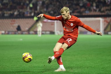 Georgie Gent of Barnsley crosses the ball during the Sky Bet League 1 match Barnsley vs Rotherham United at Oakwell, Barnsley, United Kingdom, 8th November 2024 clipart