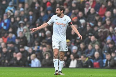 Swansea City 'den Joe Allen 10 Kasım 2024' te Burnley, Burnley City 'ye karşı oynadığı Gökyüzü İddia Şampiyonası maçında antrenman yapıyor.