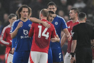 Harry Winks of Leicester City and Christian Eriksen of Manchester United embrace after the Premier League match Manchester United vs Leicester City at Old Trafford, Manchester, United Kingdom, 10th November 2024 clipart