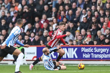 Sheffield Wednesday 'den Barry Bannan, Sheffield United' ın Sheffield Lane, Sheffield, İngiltere 'de 10 Kasım 2024' te oynanan Çarşamba günkü maçında Sheffield United ile Sheffield United arasındaki maçta faul yaptı.