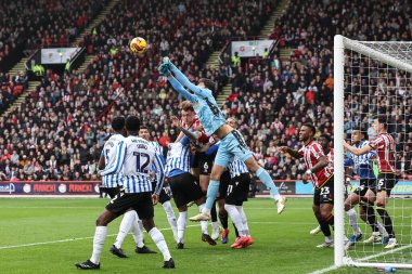 Sheffield Wednesday 'den James Beadle, 10 Kasım 2024' te Sheffield United ile Sheffield Çarşamba günü İngiltere 'nin başkenti Sheffield' da oynanan Sky Bet Şampiyonası maçında köşeden vuruyor.