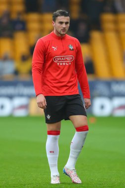 Southampton 'dan Taylor Harwood-Bellis, 9 Kasım 2024' te İngiltere 'nin Molineux kentinde oynanan Premier League maçında Wolverhampton Wanderers ile Southampton maçında ısındı.