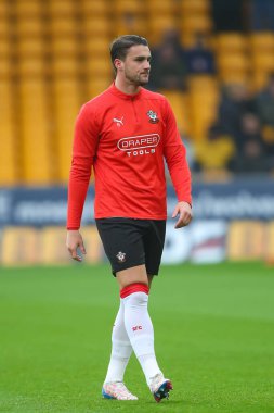 Southampton 'dan Taylor Harwood-Bellis, 9 Kasım 2024' te İngiltere 'nin Molineux kentinde oynanan Premier League maçında Wolverhampton Wanderers ile Southampton maçında ısındı.