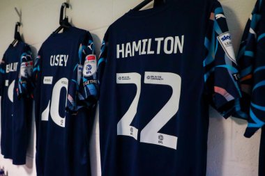 The shirt of CJ Hamilton of Blackpool is displayed inside the away dressing room prior to during the Sky Bet League 1 match Leyton Orient vs Blackpool at Gaughan Group Stadium, London, United Kingdom, 9th November 2024 clipart