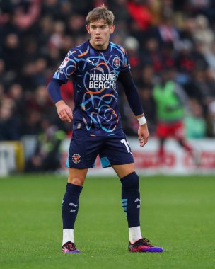 Dom Ballard of Blackpool looks on during the Sky Bet League 1 match Leyton Orient vs Blackpool at Gaughan Group Stadium, London, United Kingdom, 9th November 2024 clipart