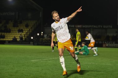 Blackpool 'dan Jordan Rhodes, 12 Kasım 2024' te İngiltere 'nin Harrogate Road, Harrogate' de oynanan Bristol Street Motors Kupası karşılaşmasında 2-1 kazanma hedefini kutluyor.