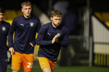 Maç öncesi ısınma oturumunda Blackpool 'dan Matthew Pennington Bristol Street Motors Kupası maçında Harrogate Town - Blackpool Wetherby Road, Harrogate, İngiltere, 12 Kasım 2024