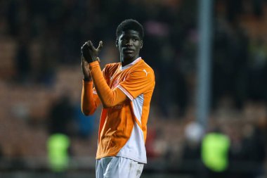 Terry Bondo of Blackpool applauds the home fans after the Sky Bet League 1 match Blackpool vs Northampton Town at Bloomfield Road, Blackpool, United Kingdom, 16th November 2024 clipart