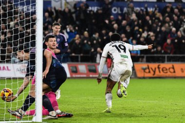Swansea City 'den Florian Bianchini, 24 Kasım 2024' te Swansea.com Stadyumu 'nda oynanan Swansea City-Leeds United maçında 3-3' lük galibiyet golünü kutluyor.