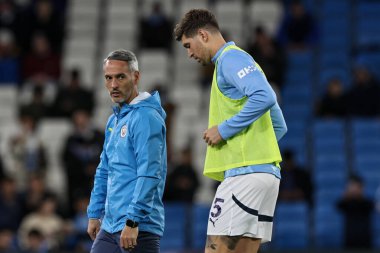 John Stones of Manchester City in the pregame warmup session during the Premier League match Manchester City vs Tottenham Hotspur at Etihad Stadium, Manchester, United Kingdom, 23rd November 2024 clipart