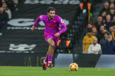 Wolverhampton Wanderers takımından Rayan Ait-Nouri, 23 Kasım 2024 'te Craven Cottage, Londra' da oynanan Premier League maçında topla koşuyor.