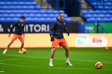 Blackpool 'dan Oliver Norburn, 21 Kasım 2024' te İngiltere 'nin Bolton Stadyumu' nda oynanan Sky Bet Ligi 1 maçı öncesinde oynanan maç öncesi ısınma maçında Bolton Wanderers, Blackpool 'a karşı.