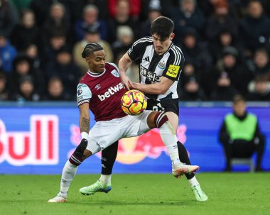 Crysencio Summerville of West Ham United and Tino Livramento of Newcastle United battle for the ball during the Premier League match Newcastle United vs West Ham United at St. James's Park, Newcastle, United Kingdom, 25th November 2024 clipart