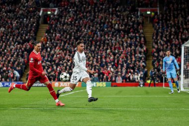 Ral Asencio of Real Madrid clears the ball from Darwin Nunez of Liverpool during the UEFA Champions League, League Phase MD5 Liverpool v Real Madrid at Anfield, Liverpool, United Kingdom, 27th November 2024 clipart