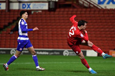 Barnsley's Josh Earl shoots during the Sky Bet League 1 match Barnsley vs Reading at Oakwell, Barnsley, United Kingdom, 26th November 2024 clipart