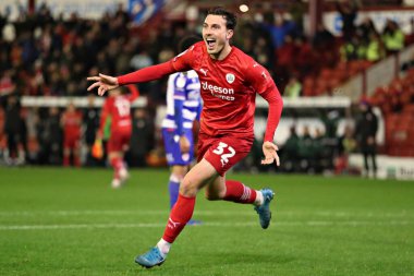 Barnsley 'den Josh Earl, 26 Kasım 2024' te Oakwell, Barnsley, İngiltere 'de oynanan Sky Bet 1 maçında golünü kutluyor.