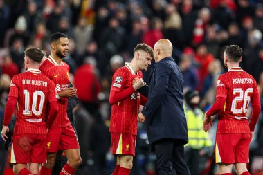 Arne Slot of Liverpool celebrates after the teams victory with Conor Bradley following the UEFA Champions League, League Phase MD5 Liverpool v Real Madrid at Anfield, Liverpool, United Kingdom, 27th November 2024 clipart