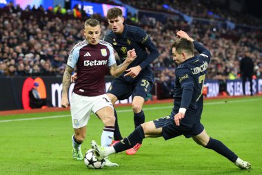 Aston Villa 'dan Lucas Digne, UEFA Şampiyonlar Ligi, Lig Faz MD5 karşılaşması sırasında Juventus' lu Francisco Conceio tarafından Villa Park, Birmingham, Birleşik Krallık 'ta 27 Kasım 2024' te oynanan karşılaşmada yenildi.