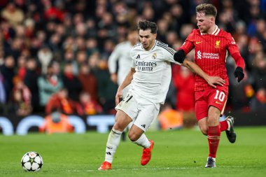 Real Madrid 'den Brahim Daz, UEFA Şampiyonlar Ligi, Lig Faz MD5 Liverpool - Real Madrid Anfield, Liverpool, Birleşik Krallık' ta 27 Kasım 2024 tarihinde Liverpool Ligi takımlarından Alexis Mac Allister tarafından baskı altına alınmıştır.