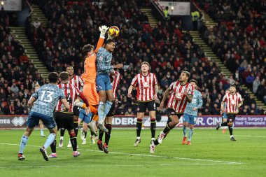 Sheffield United 'dan Michael Cooper ve Sunderland' dan Wilson Isidor Sky Bet Şampiyonası maçında Sheffield United 'a karşı Sunderland Bramall Lane, Sheffield, Birleşik Krallık' ta 29 Kasım 2024 'te top için mücadele ettiler.