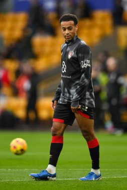 Bournemouth 'dan Tyler Adams Premier Lig karşılaşması öncesinde Molineux, Wolverhampton, Birleşik Krallık' ta oynanan Wolverhampton Wanderers - Bournemouth maçında ısınma turunda 30 Kasım 2024
