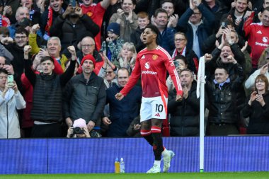 Marcus Rashford of Manchester United celebrates his goal to make it 1-0 during the Premier League match Manchester United vs Everton at Old Trafford, Manchester, United Kingdom, 1st December 202 clipart