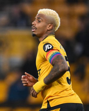 Mario Lemina of Wolverhampton Wanderers with a rainbow captains armband during the Premier League match Wolverhampton Wanderers vs Bournemouth at Molineux, Wolverhampton, United Kingdom, 30th November 2024 clipart