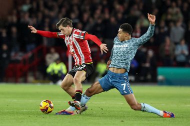 Sheffield United takımından Sydie Peck, 29 Kasım 2024 'te Sheffield Lane, Sheffield, Birleşik Krallık' ta oynanan Sky Bet Şampiyonası karşılaşmasında Sunderland 'lı Jobe Bellingham' a yenildi.