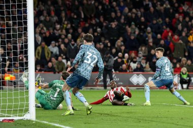 Sunderland 'dan Anthony Patterson, Sheffield United takımından Femi Seriki' yi 29 Kasım 2024 'te Bramall Lane, Sheffield, İngiltere' de oynanan Sunderland maçında kurtardı.