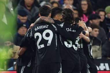 Arsenal 'li Gabriel, 30 Kasım 2024' te Londra Stadyumu 'nda oynanan Premier League maçında West Ham United ve Arsenal maçında 0-1 kazanma hedefini kutluyor.
