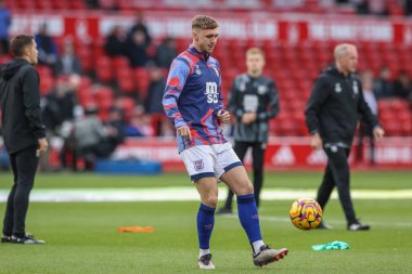 Ipswich Town 'dan Jack Taylor 30 Kasım 2024' te İngiltere 'nin Nottingham City Ground kentinde oynanan Premier League maçı sırasında ısınma turunda Nottingham Forest Ipswich Town' a karşı.