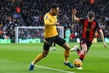 Matheus Cunha of Wolverhampton Wanderers makes a break with the ball during the Premier League match Wolverhampton Wanderers vs Bournemouth at Molineux, Wolverhampton, United Kingdom, 30th November 2024 clipart