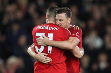 Nottingham Ormanı 'ndan Nikola Milenkovi ve Nottingham Ormanı' ndan Chris Wood, 30 Kasım 2024 'te İngiltere' nin Nottingham City Ground kentinde oynanan Premier Lig maçı Nottingham Ormanı - Ipswich Town maçında kazandıkları zaferi kutluyorlar.