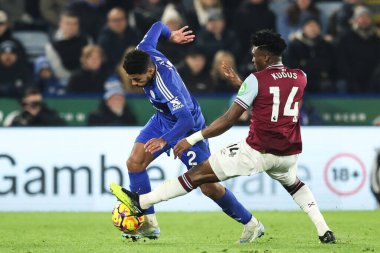 Mohammed Kudus of West Ham United tackles James Justin of Leicester City during the Premier League match Leicester City vs West Ham United at King Power Stadium, Leicester, United Kingdom, 3rd December 2024 clipart