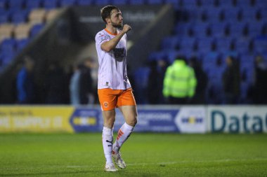 Blackpool takımlarından Matthew Pennington, 4 Aralık 2024 'te Croud Meadow, Shrewsbury, İngiltere' de oynanan Sky Bet 1 karşılaşmasında takımının kazanmasını kutluyor.