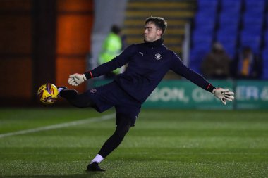 Blackpool 'dan Harry Tyrer 4 Aralık 2024' te Croud Meadow, Shrewsbury, İngiltere 'de oynanan Sky Bet Ligi 1 maçı öncesinde ısınma turunda