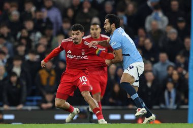 Nottingham Ormanı 'ndan Morgan Gibbs-White, Manchester City - Nottingham Forest maçında Manchester City' nin 4 Aralık 2024 'te Etihad Stadyumu' nda oynadığı maçta Manchester City 'li lkay Gndoan' a faul yaptı.