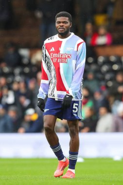 Arsenal 'den Thomas Partey Premier Lig maçı öncesinde 8 Aralık 2024' te Craven Cottage, Londra 'da oynanan Fulham-Arsenal maçında ısındı.