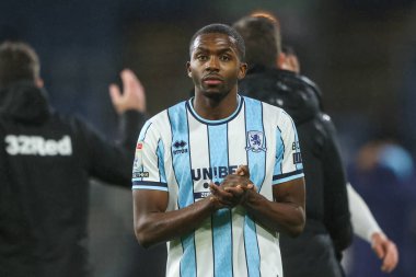 Middlesbrough takımından Anfernee Dijksteel, 6 Aralık 2024 'te Burnley ile Middlesbrough arasında oynanan Sky Bet Şampiyonası maçının sonunda taraftarları alkışlıyor.