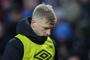 Brentford 'dan Ben Mee Premier League karşılaşmasında ısınma turunda Brentford Newcastle United' a karşı Gtech Community Stadyumu, Londra, 7 Aralık 2024