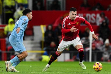Manchester United 'dan Diogo Dalot, Manchester United ve Nottingham Forest maçında 7 Aralık 2024 tarihinde Old Trafford, Manchester, İngiltere' de karşı karşıya geldi.