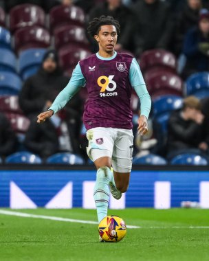 Bashir Humphreys of Burnley makes a break with the ball  during the Sky Bet Championship match Burnley vs Derby County at Turf Moor, Burnley, United Kingdom, 10th December 2024 clipart