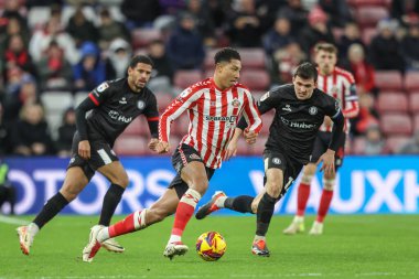 Sunderland 'dan Jobe Bellingham, 10 Aralık 2024' te İngiltere 'nin Sunderland kentinde oynanan Sunderland-Bristol City maçında topu aldı.