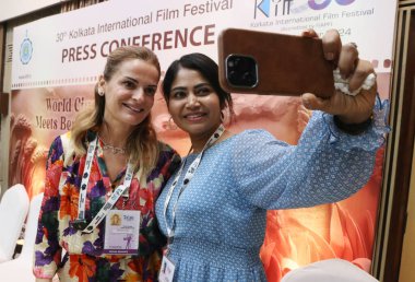 Film director Alessandra Stefani and Actress Deepthi Nirmal at the 30th Kolkata International Film Festival in Kolkata,India on December 10, 2024,Pictures by Debajyoti Chakraborty   clipart