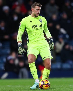 West Bromwich Albion 'dan Alex Palmer 11 Aralık 2024' te İngiltere 'nin başkenti West Bromwich Coventry City' de oynanan West Bromwich Albion-Coventry maçı sırasında iş başında.