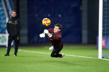 Sheffield United takımından Michael Cooper, 11 Aralık 2024 'te The Den, Londra, İngiltere' de oynanan Millwall-Sheffield United maçından önce ısınıyor.